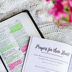 Head to Toe Prayer Journal open with Bible underneath it.