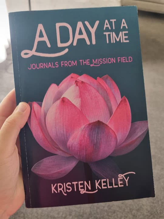 Inspirational woman’s memoir about faith and mission work, titled "A Day at a Time," by Kristen Kelley.